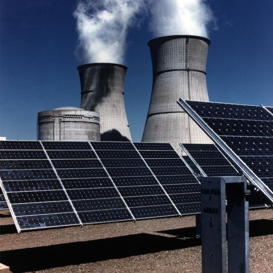 black solar panels powering a factory