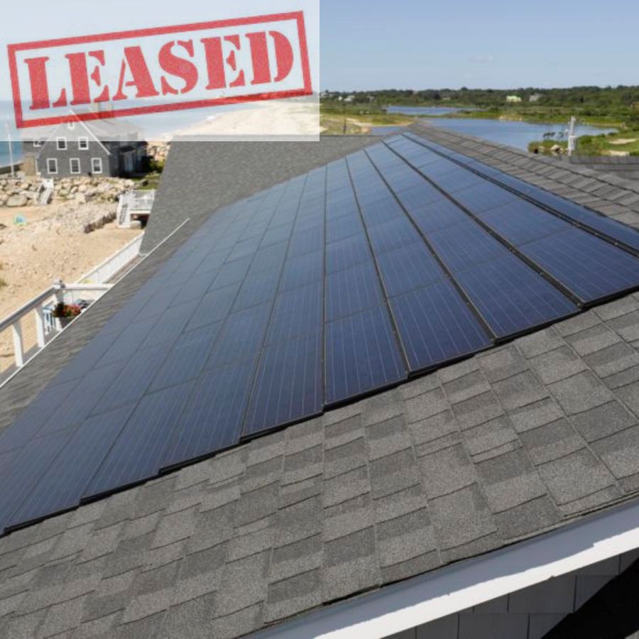 a roof with solar panels stamped as leased