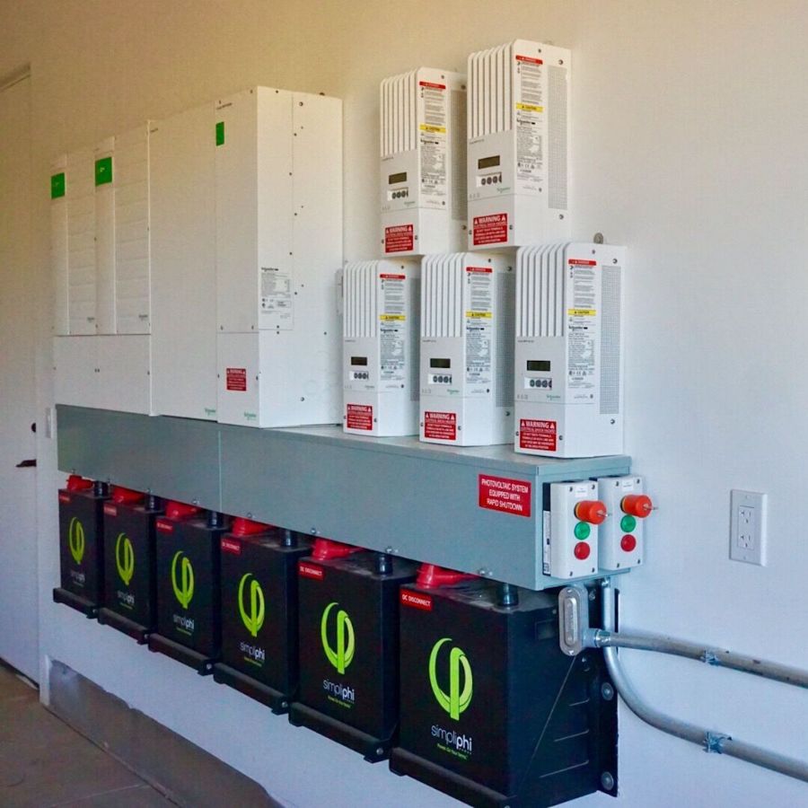a solar battery storage system on a wall