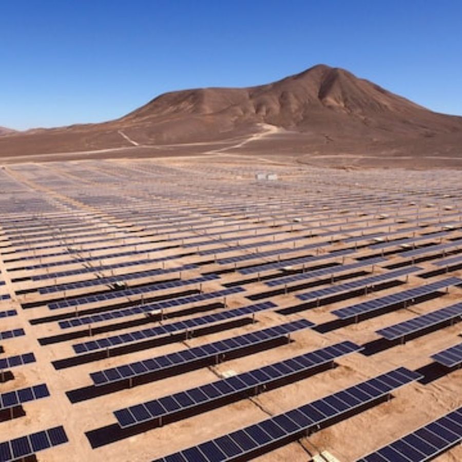 commercial solar panels near a mountain