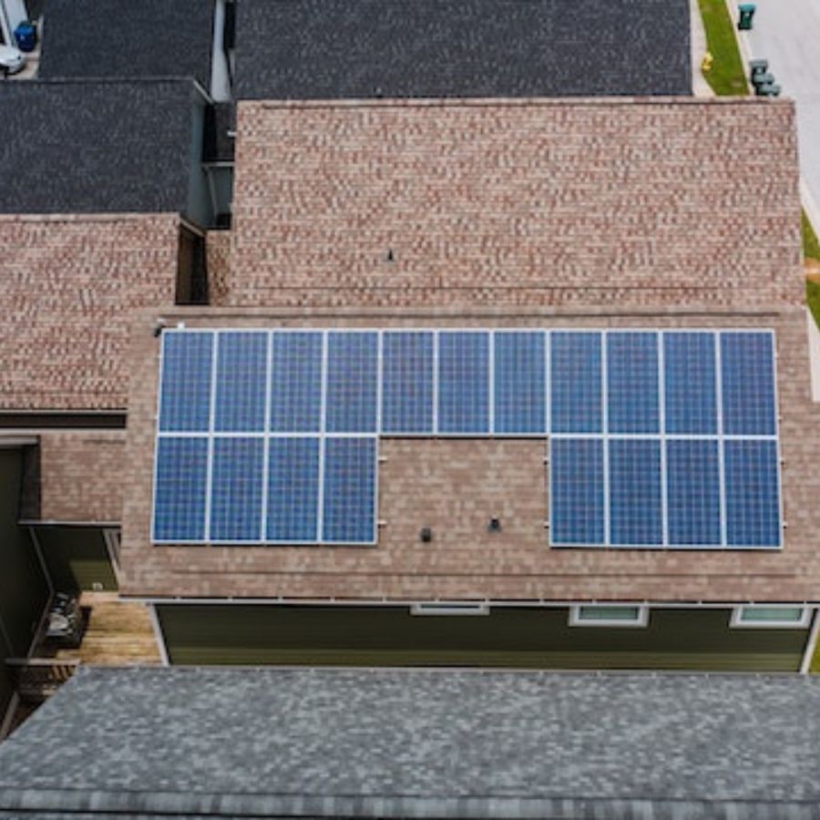 A roof with many solar panels